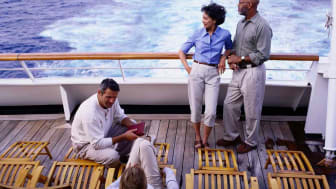 Passengers enjoy a cruise ship